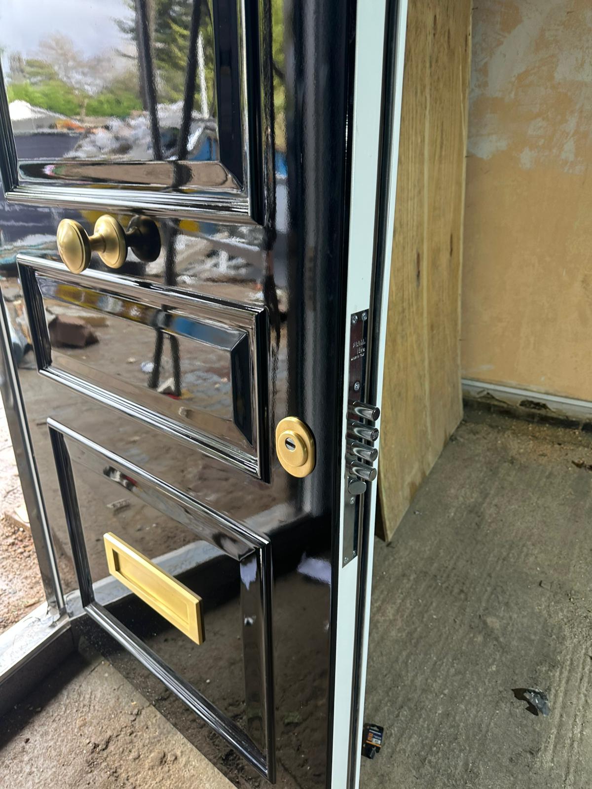 Close-up of door and window hardware on an Essex installation — project 2